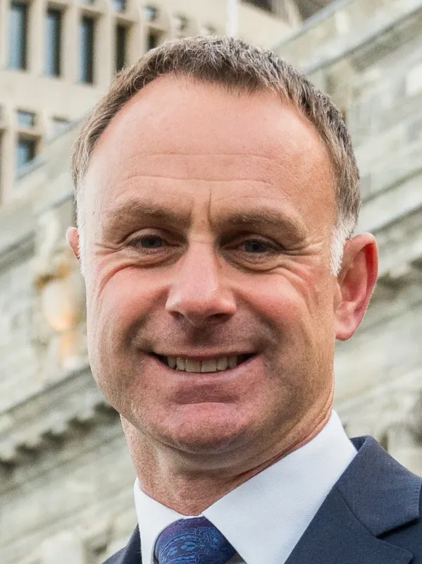 A portrait of Simon Watts MP