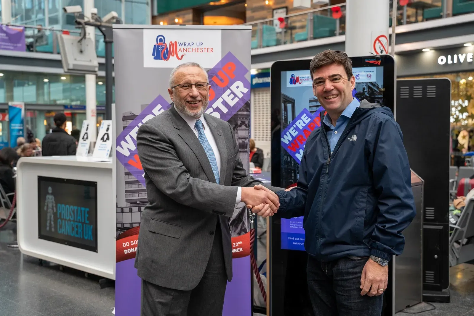 Andy Burnham (right), Mayor of Greater Manchester visits Human Appeal's UK annual winter coat collection campaign and meets with Human Appeal CEO Dr. Mohamed Ashmawey.