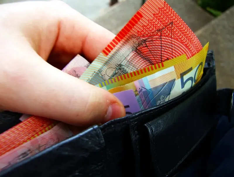 Australian banknotes in a wallet.